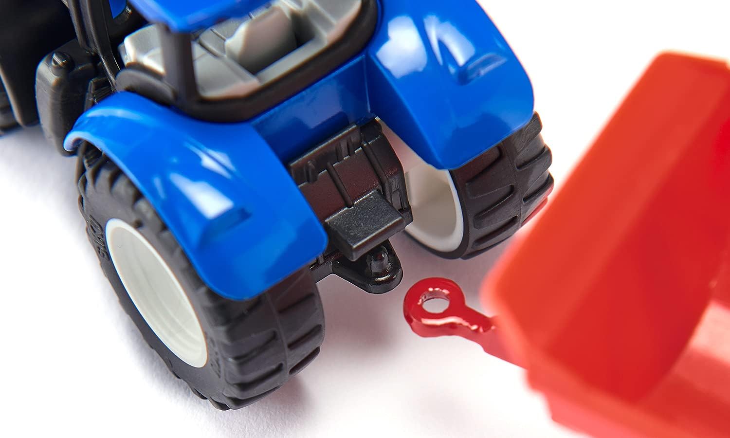 Modellino Trattore New Holland con Forche Siku 1544