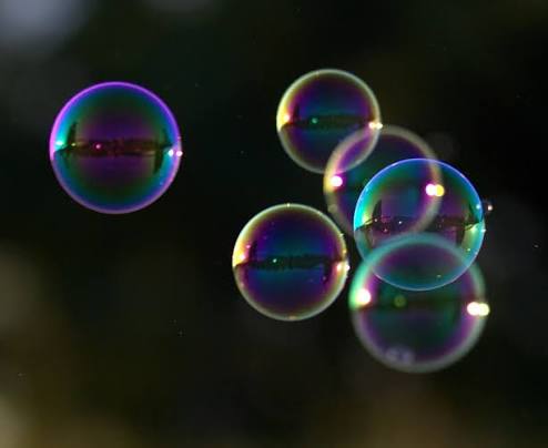 Pistola Sparabolle Dinosauri con Luce Kidz Toys